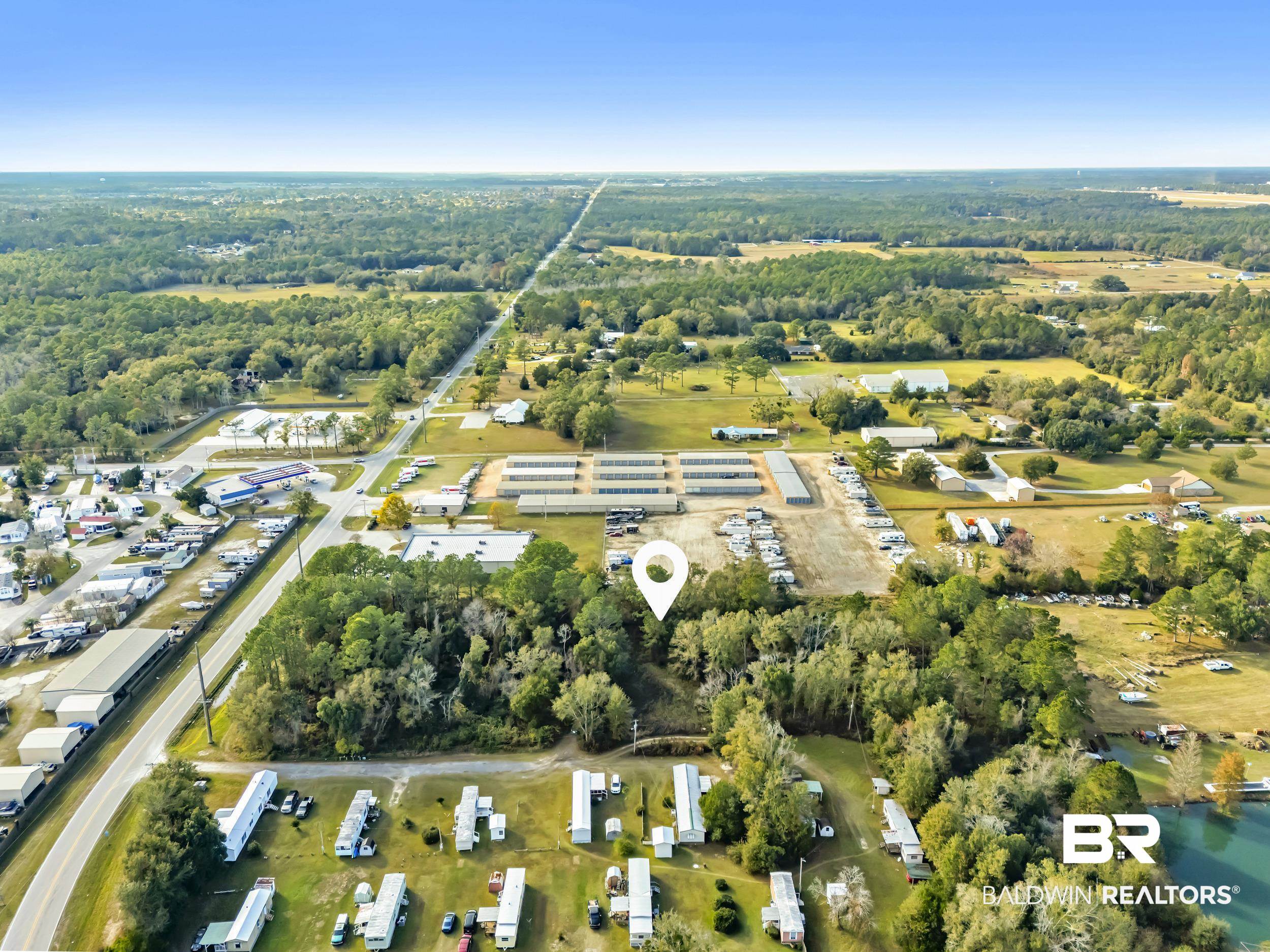 9967 County Road 83 Elberta, AL 36530 - Photo 10 of 21 Aerial view of property and surrounding area with an industrial area