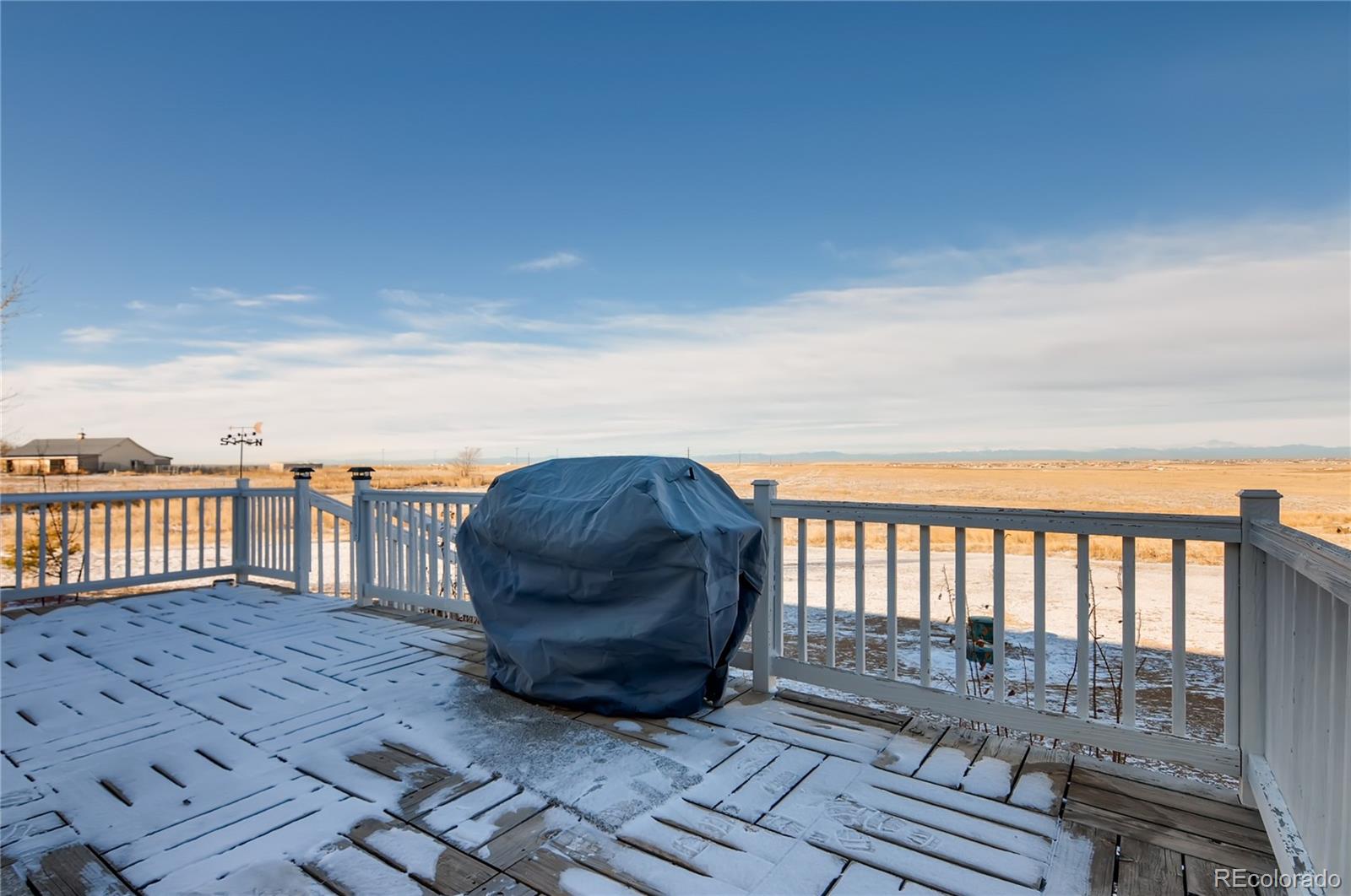 13801 Cavanaugh Road Hudson, CO 80642 - Photo 26 of 39 a view of a roof deck
