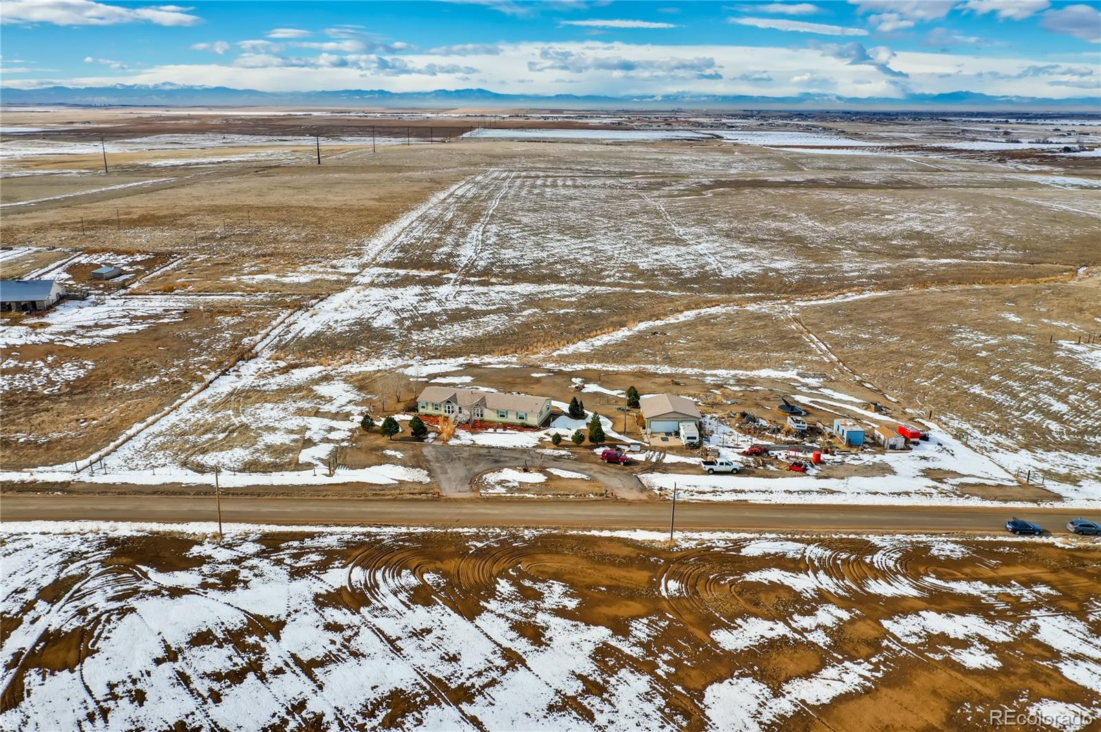 13801 Cavanaugh Road Hudson, CO 80642 - Photo 30 of 39 a view of an ocean and beach