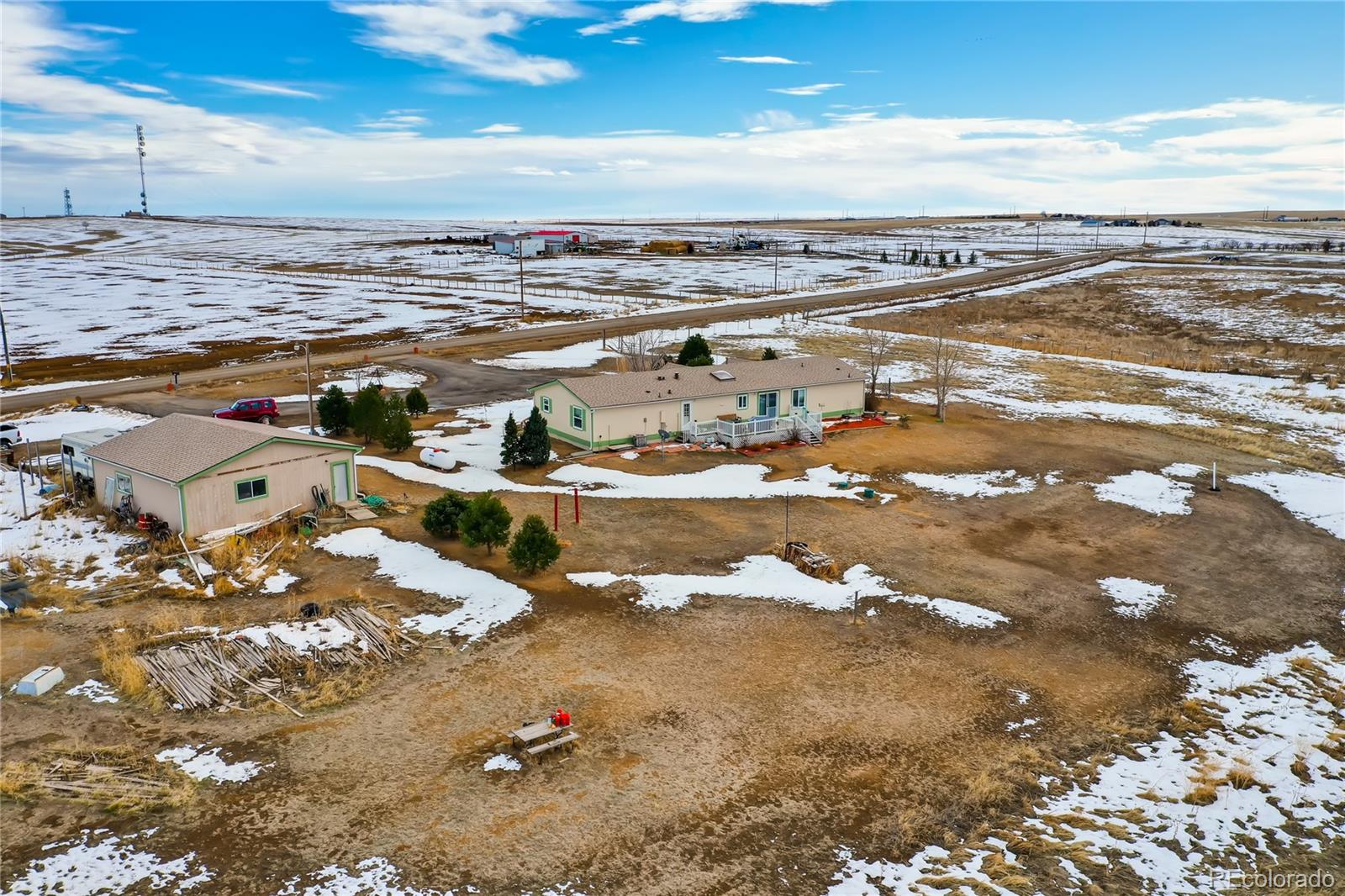 13801 Cavanaugh Road Hudson, CO 80642 - Photo 38 of 39 a view of an ocean and beach