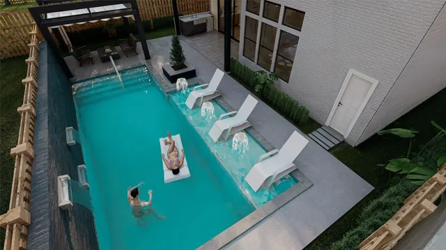a view of a livingroom with furniture and windows