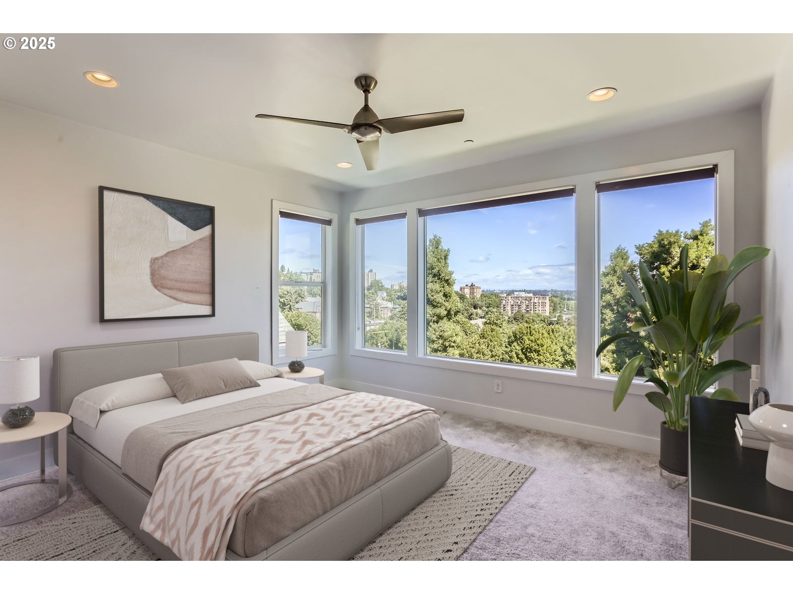 1625 Southwest Montgomery Street, Unit C Portland, OR 97201 - Photo 17 of 41 a bedroom with a large bed and a potted plant