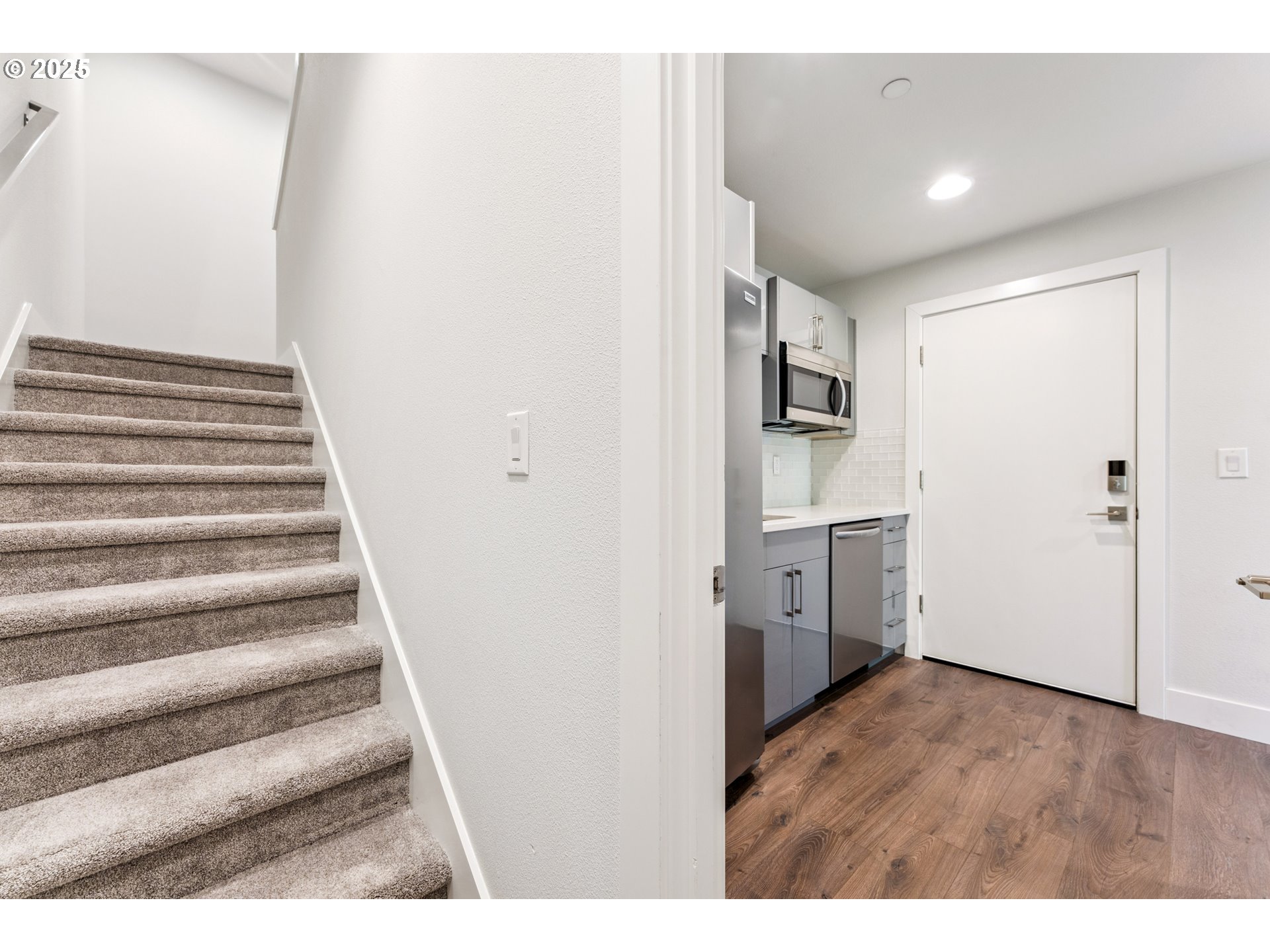 1625 Southwest Montgomery Street, Unit C Portland, OR 97201 - Photo 30 of 41 a view of a kitchen with refrigerator and microwave