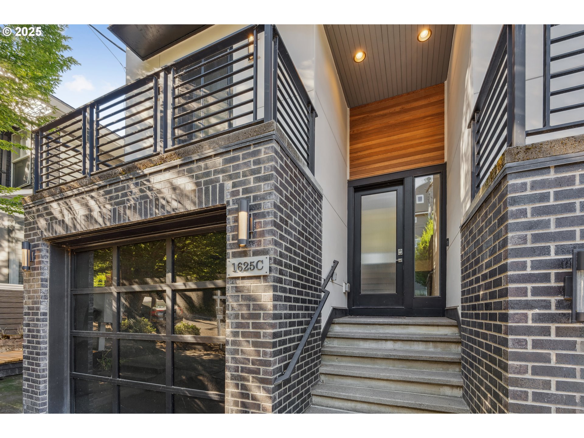 1625 Southwest Montgomery Street, Unit C Portland, OR 97201 - Photo 3 of 41 a view of a house with entryway and wooden floor