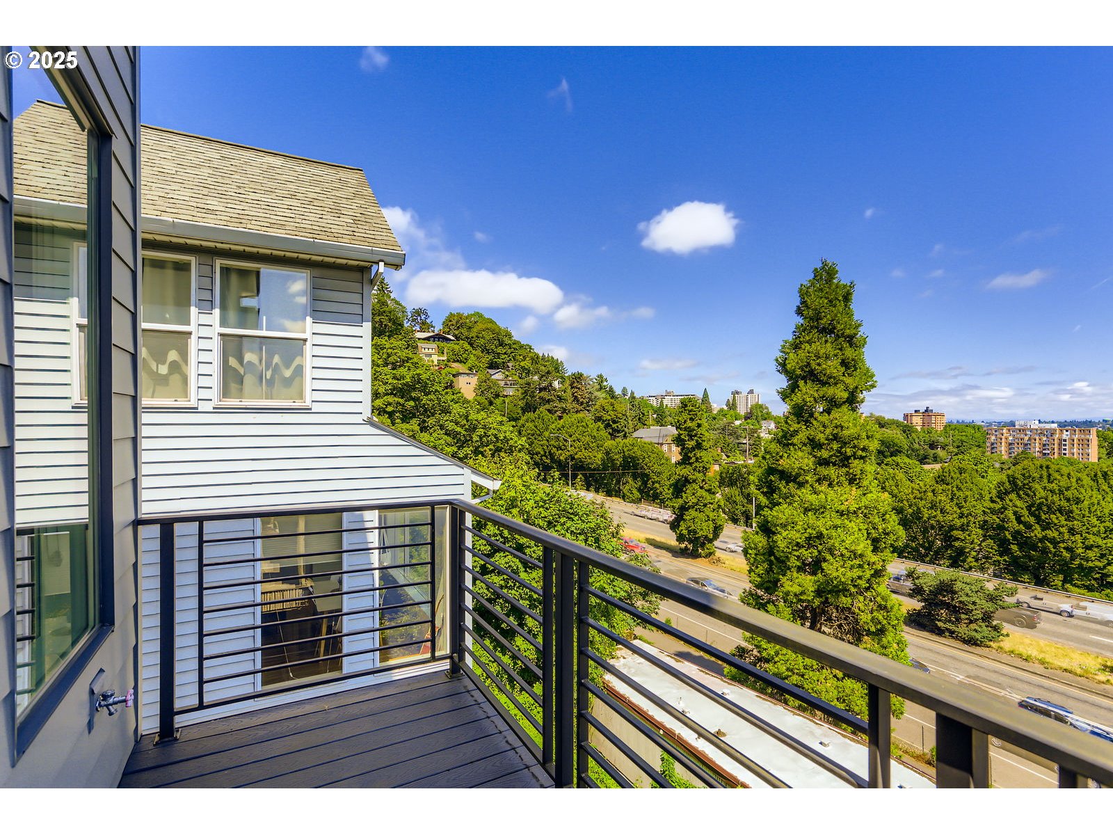 1625 Southwest Montgomery Street, Unit C Portland, OR 97201 - Photo 36 of 41 a balcony view with an outdoor space