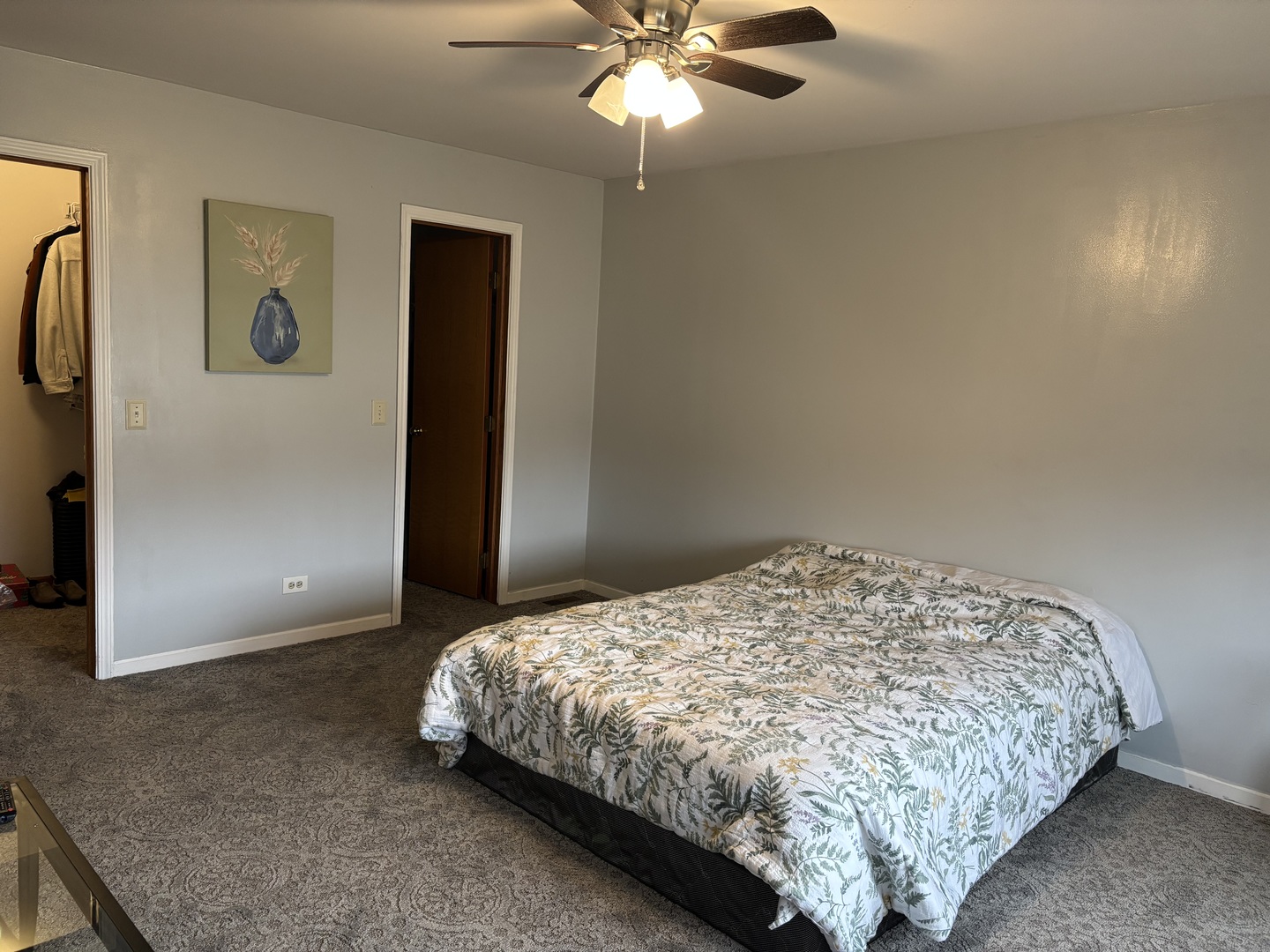 2323 Bluejay Trail Elgin, IL 60123 - Photo 11 of 18 a bedroom with a bed and a chandelier