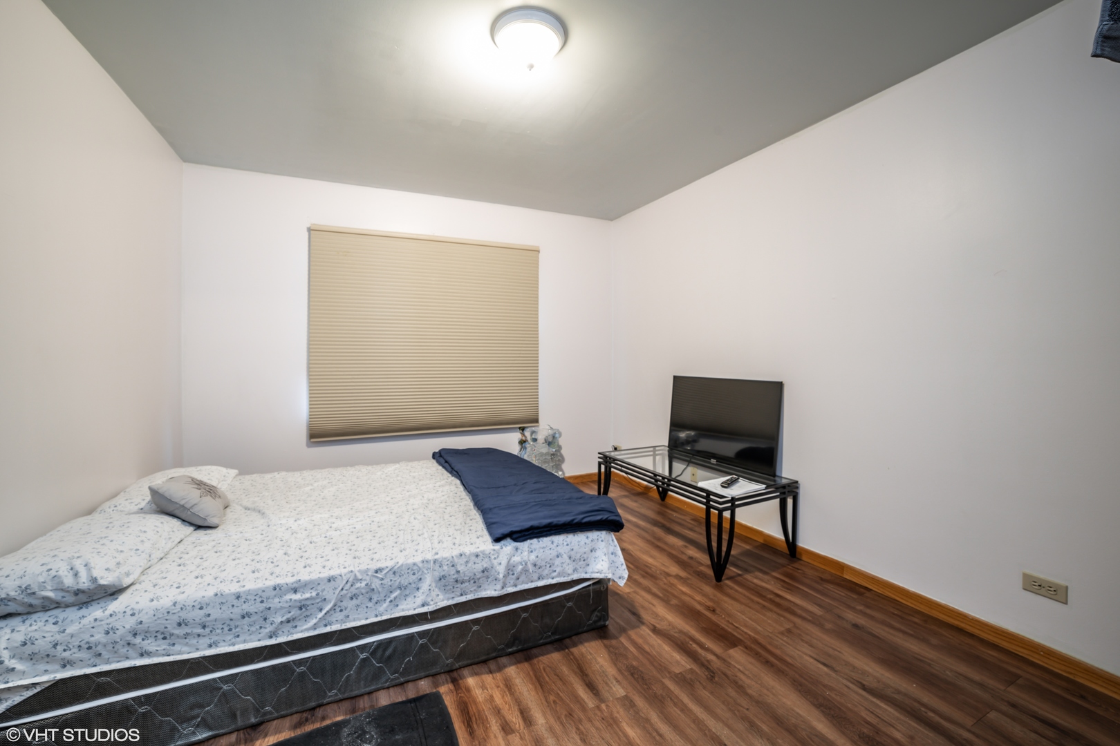 2323 Bluejay Trail Elgin, IL 60123 - Photo 12 of 18 a bedroom with a bed and wooden floor