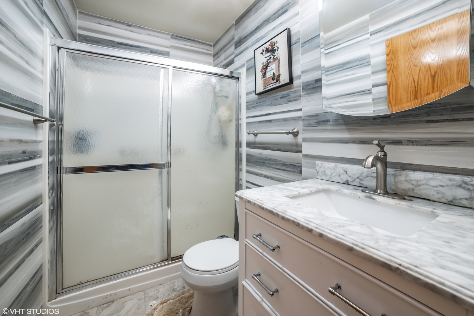 2323 Bluejay Trail Elgin, IL 60123 - Photo 10 of 18 a bathroom with a granite countertop sink toilet and shower