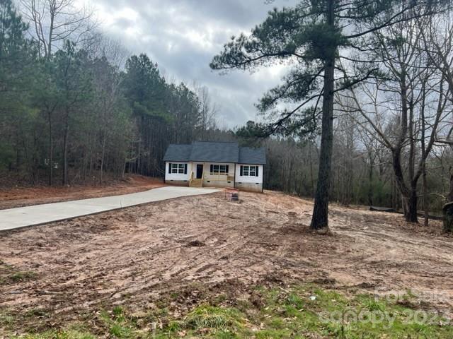 429 Fleetwood Road York, SC 29745 - Photo 2 of 9 a backyard of a house with lots of green space