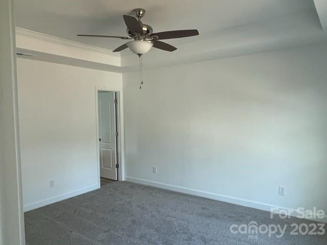 429 Fleetwood Road York, SC 29745 - Photo 4 of 9 an empty room with a ceiling fan and a window