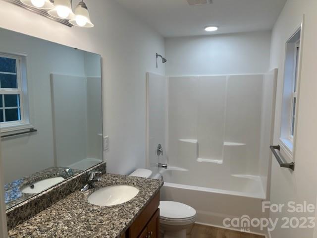 429 Fleetwood Road York, SC 29745 - Photo 5 of 9 a bathroom with a granite countertop sink toilet and shower