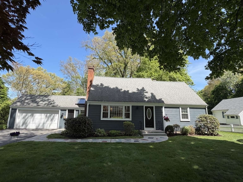 74 Birch Road Longmeadow, MA 01106 - Photo 1 of 38 a front view of a house with a garden and porch