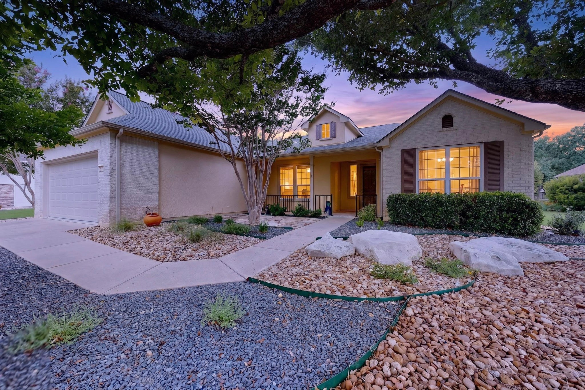 207 Red Poppy Trail Georgetown, TX 78633 - Photo 1 of 31 Mature trees and beautiful landscaping create an inviting walkup.