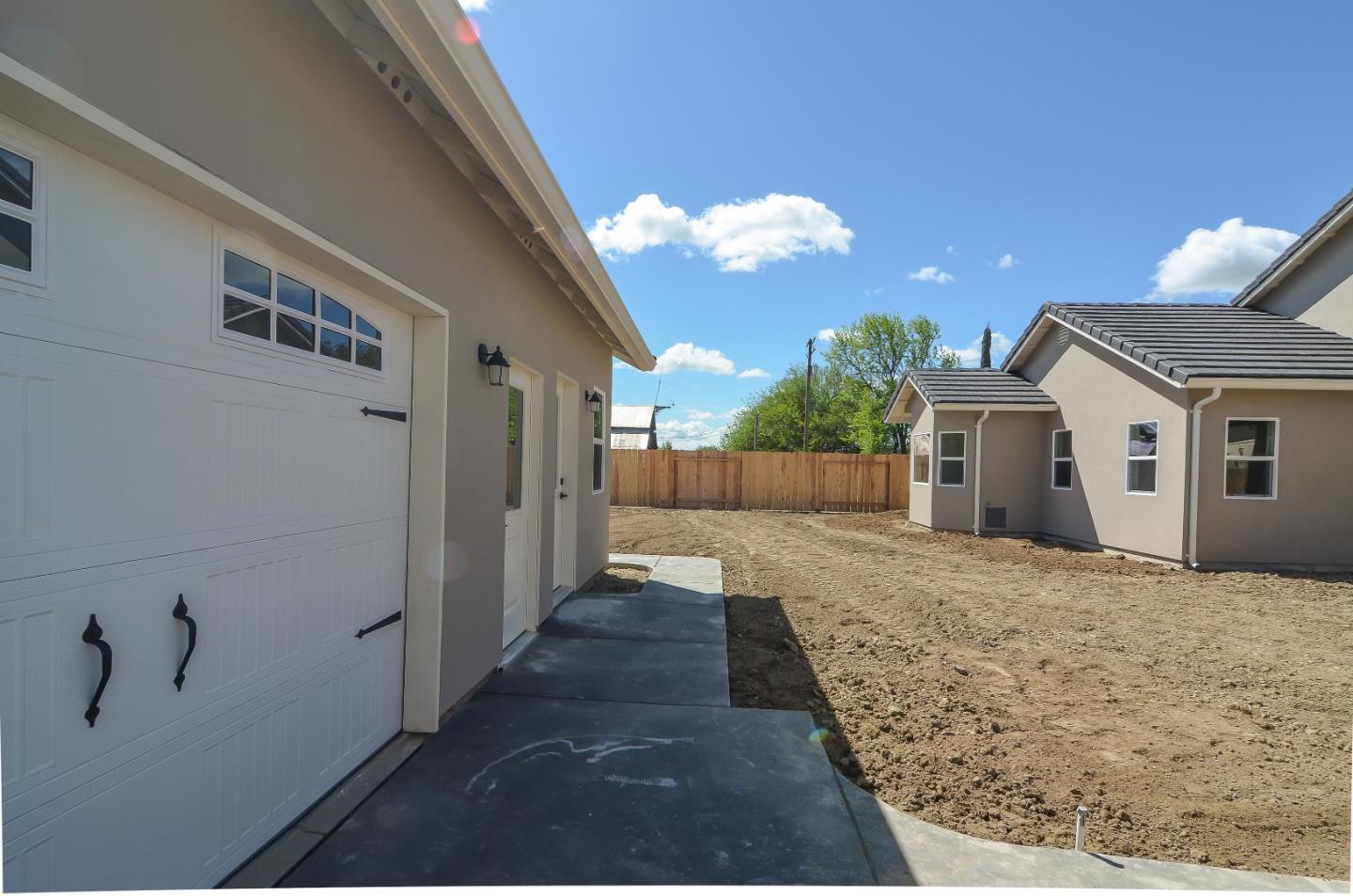 684 South Mohler Road Ripon, CA 95366 - Photo 36 of 41 a view of a house with a backyard