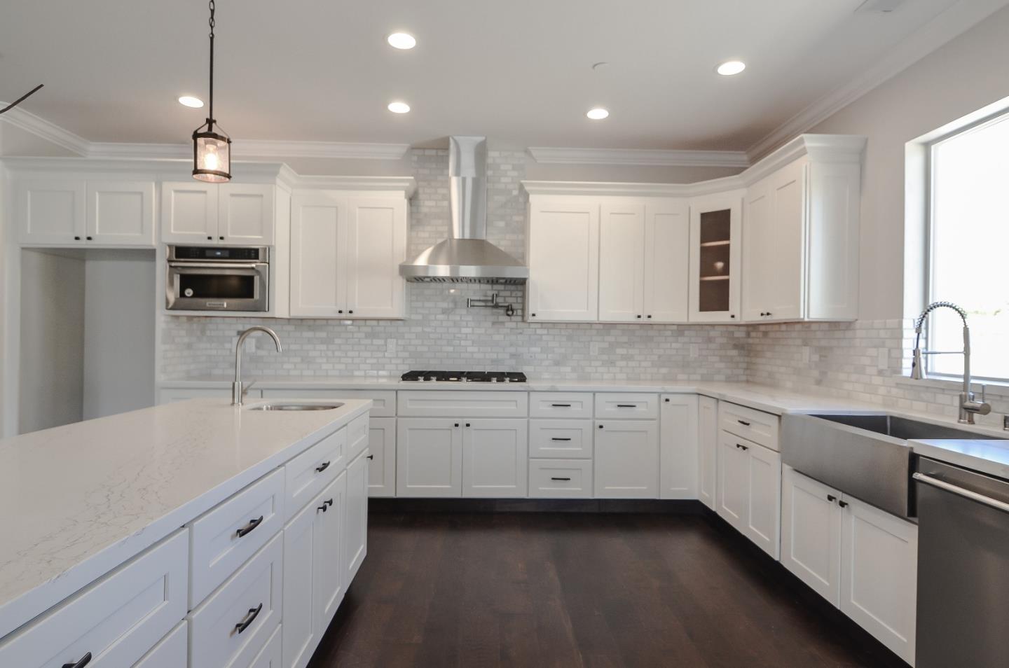 684 South Mohler Road Ripon, CA 95366 - Photo 8 of 41 a kitchen with sink stove and cabinets
