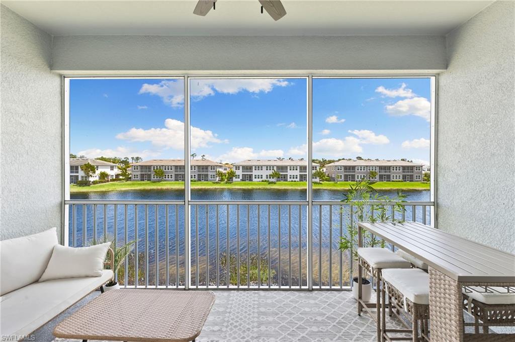 4607 Arboretum Circle, Unit 202 Naples, FL 34112 - Photo 29 of 39 a view of a balcony with furniture