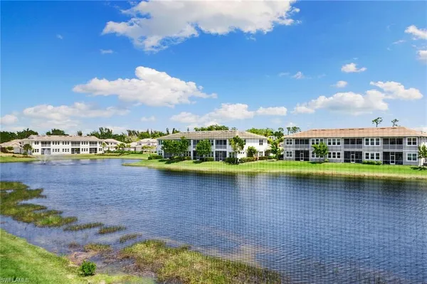 a view of a lake with houses