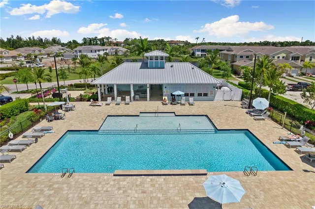 a view of a house with a big yard