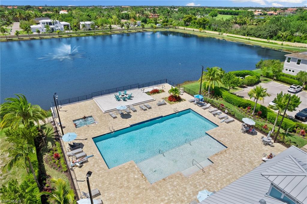 4607 Arboretum Circle, Unit 202 Naples, FL 34112 - Photo 4 of 39 an aerial view of a house with a yard and lake view