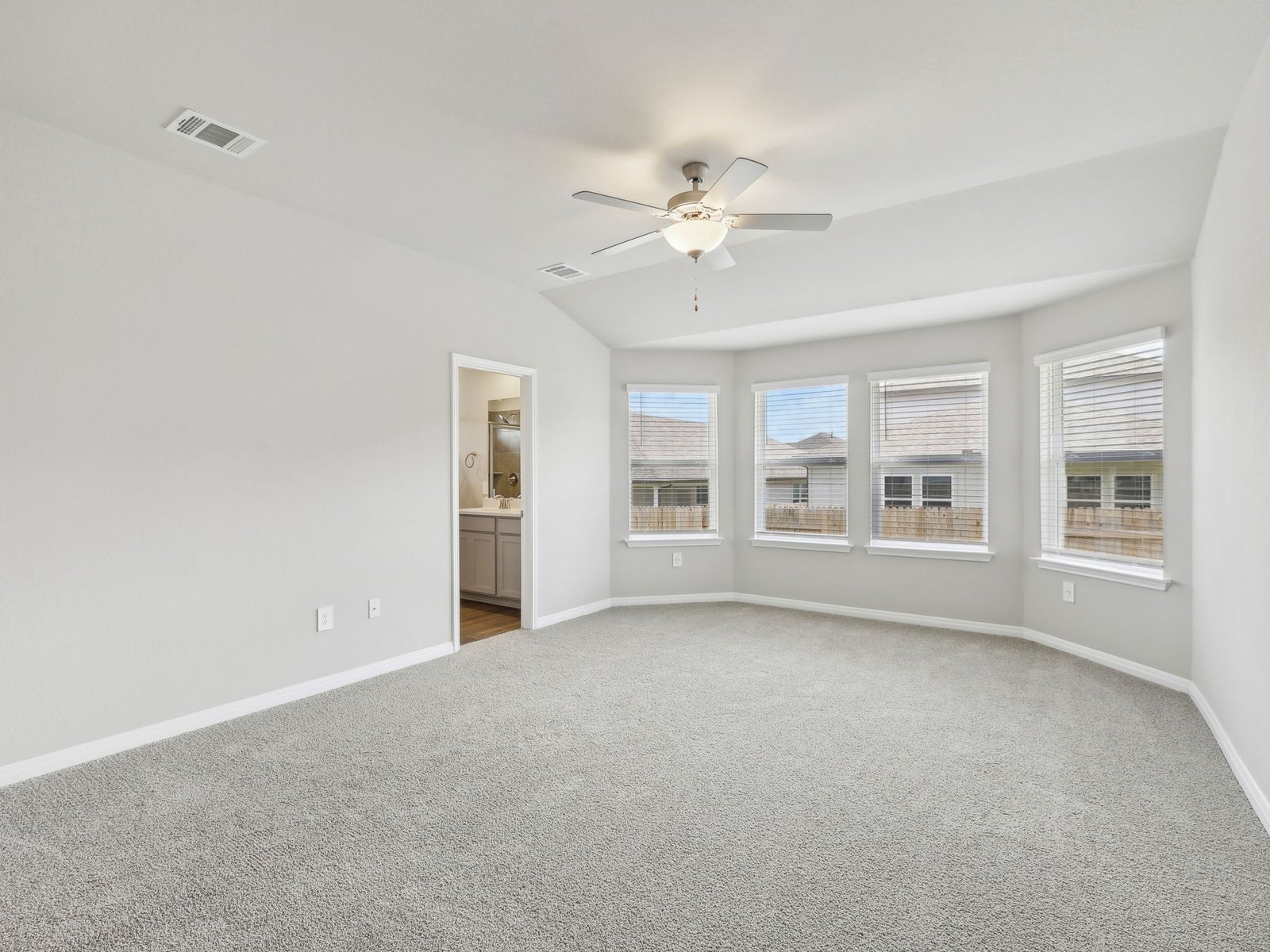128 Hayburner Road Burnet, TX 78611 - Photo 6 of 12 a view of an empty room with a window