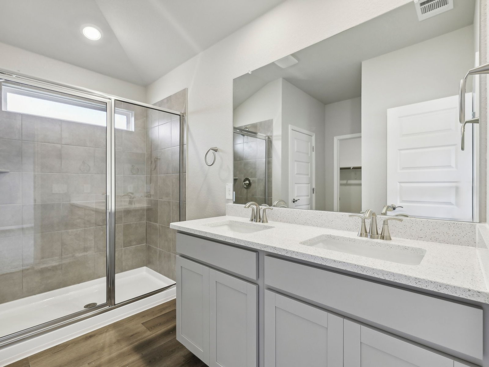 128 Hayburner Road Burnet, TX 78611 - Photo 7 of 12 a bathroom with a shower sink and mirror