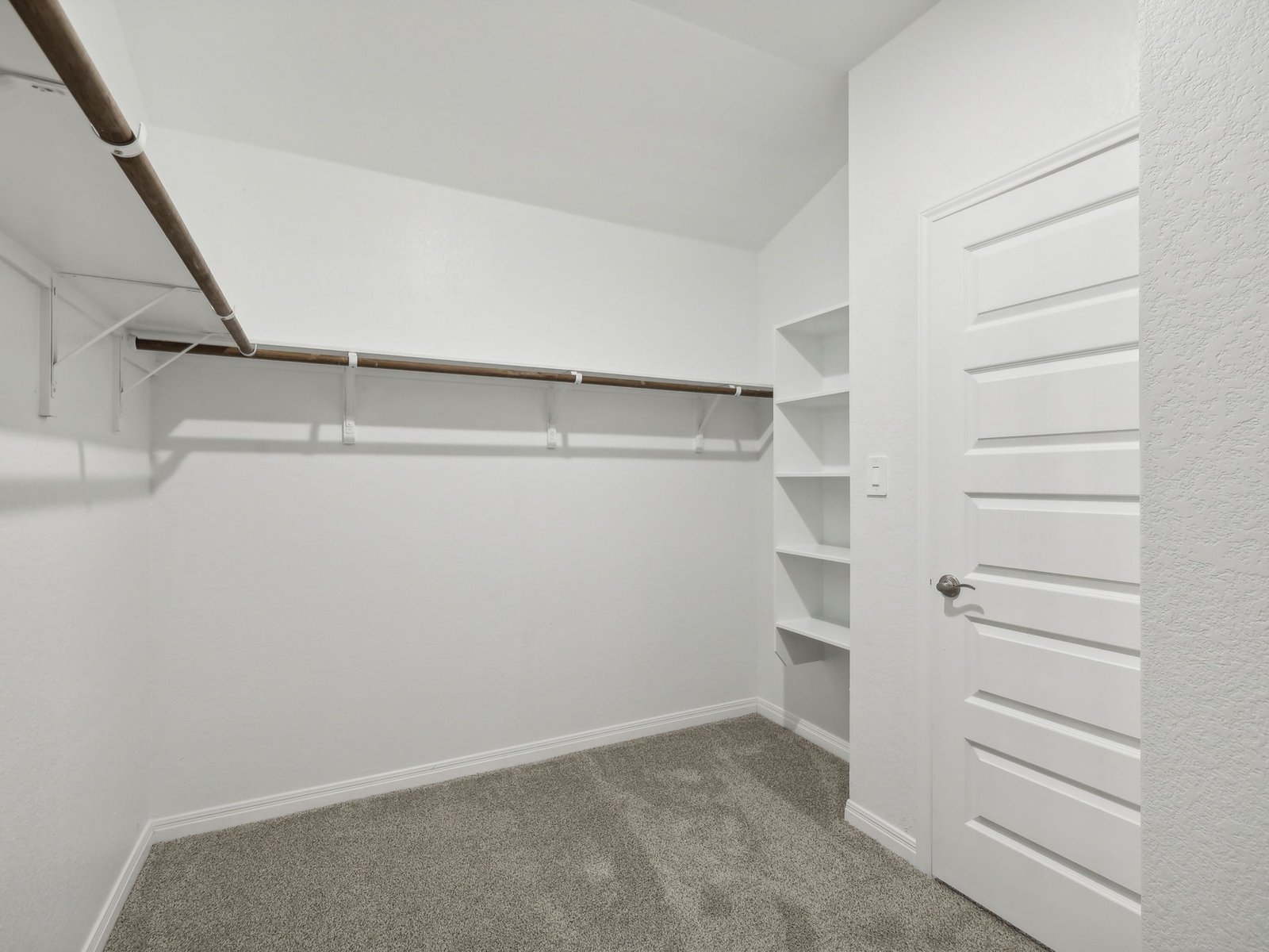 128 Hayburner Road Burnet, TX 78611 - Photo 8 of 12 a view of an empty walk in closet