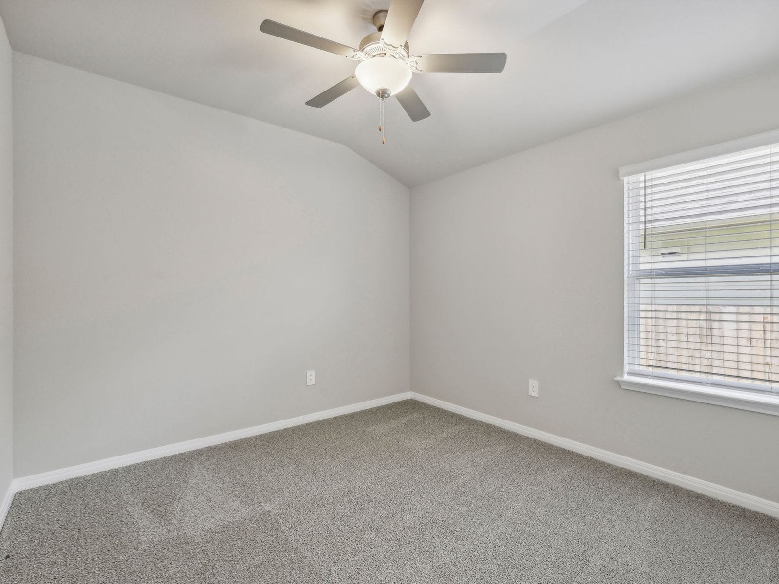 128 Hayburner Road Burnet, TX 78611 - Photo 9 of 12 a view of an empty room with a window