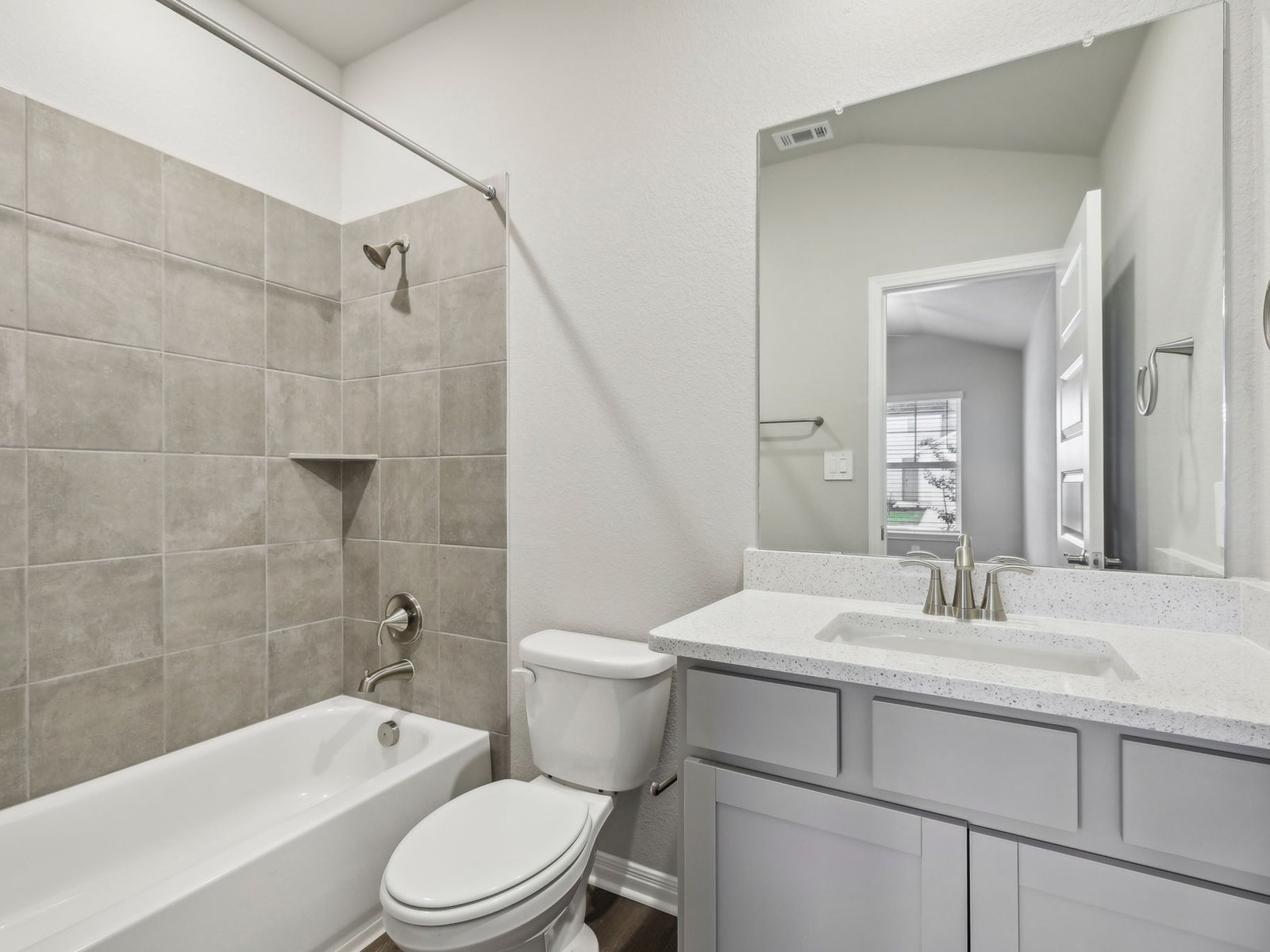 128 Hayburner Road Burnet, TX 78611 - Photo 10 of 12 a bathroom with a sink toilet and shower