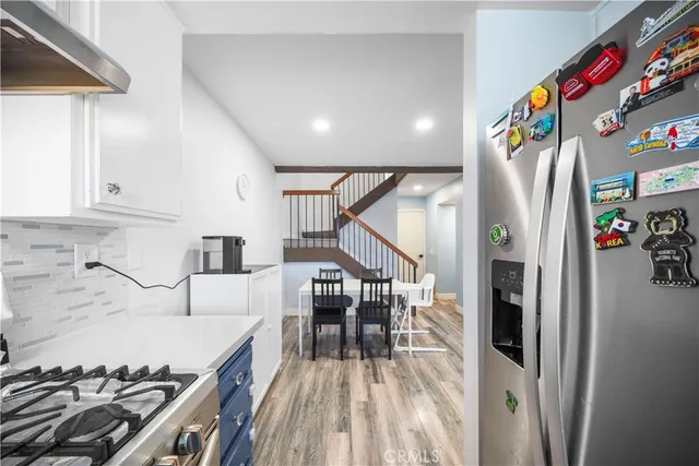 a bedroom with a bed and a chair