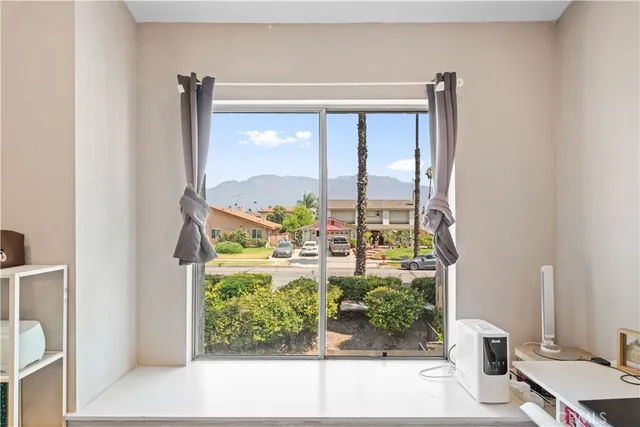 front view of a house with a small yard