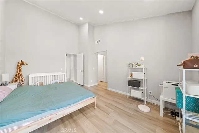 a aerial view of a house with swimming pool and chairs