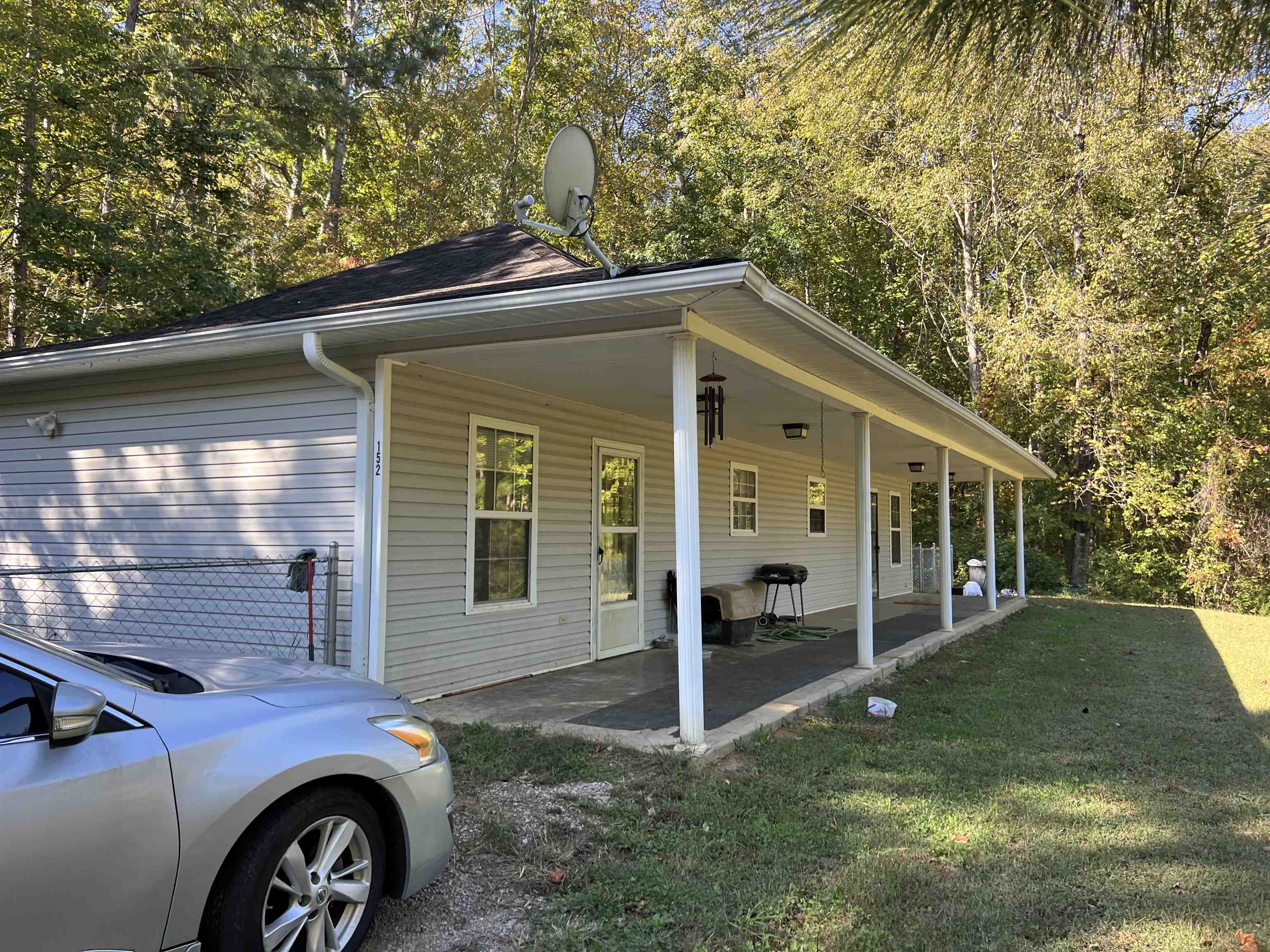 180-150 Burks Road Savannah, TN 38372 - Photo 11 of 11 a front view of a house with a yard