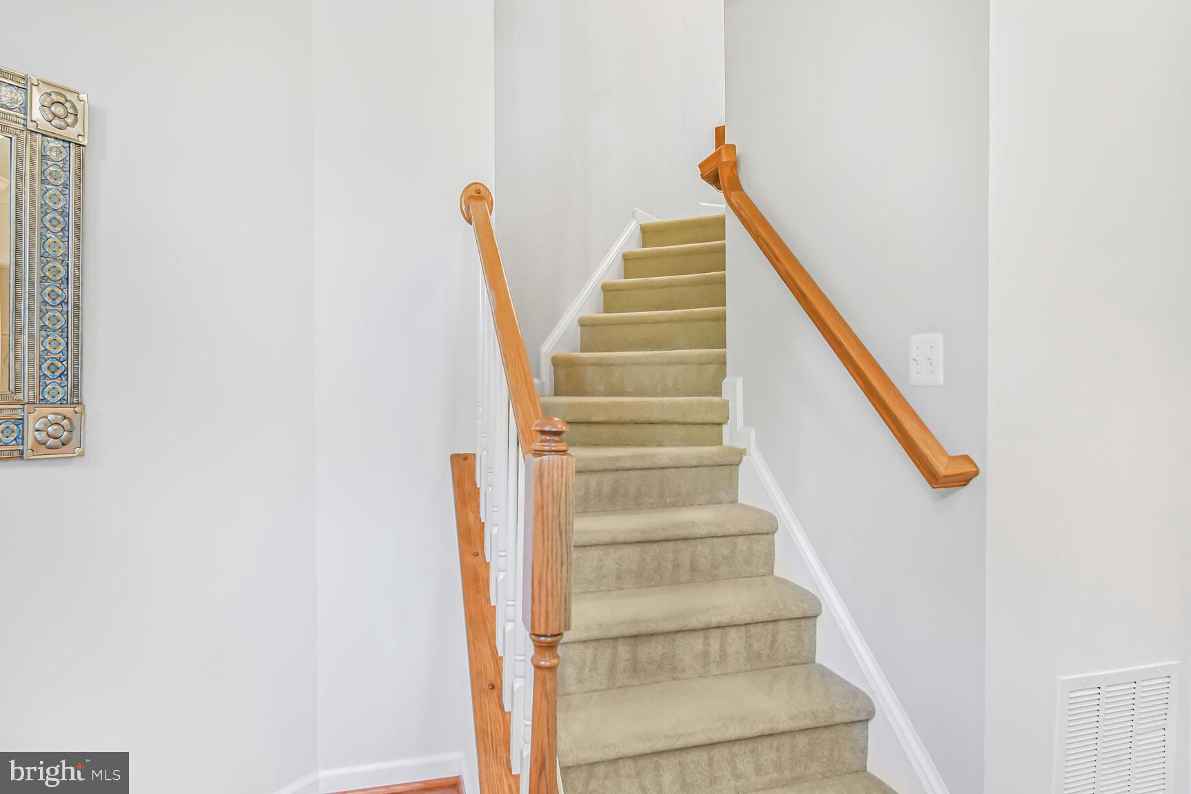 42952 Miltec Terrace Chantilly, VA 20152 - Photo 14 of 30 a view of staircase with white walls