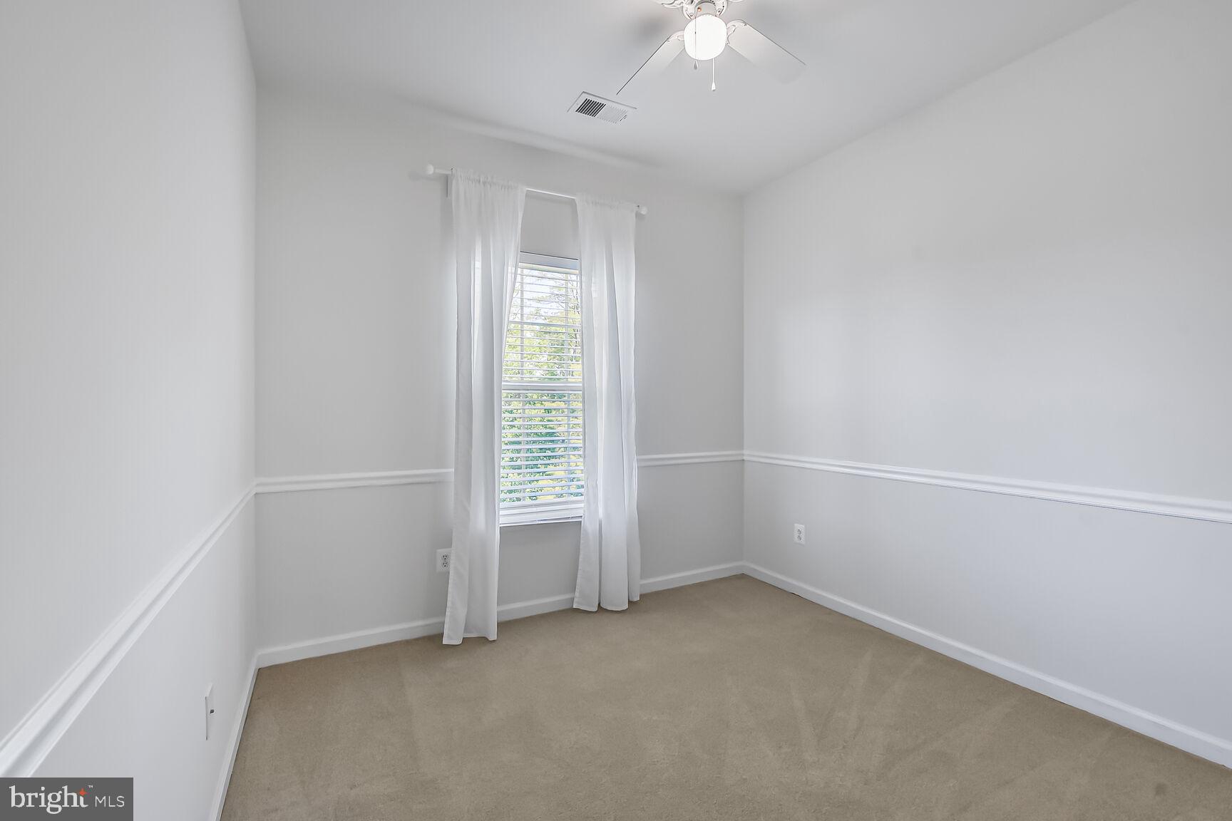 42952 Miltec Terrace Chantilly, VA 20152 - Photo 16 of 30 an empty room with a empty space and a window