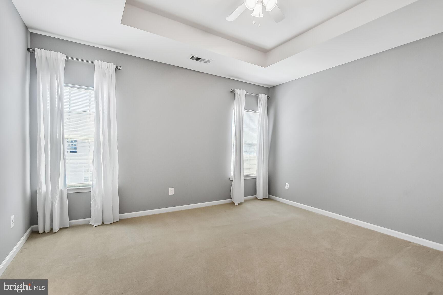 42952 Miltec Terrace Chantilly, VA 20152 - Photo 17 of 30 an empty room with windows and closet