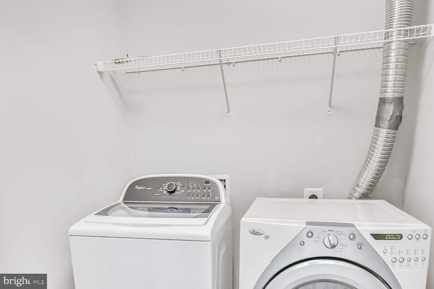 42952 Miltec Terrace Chantilly, VA 20152 - Photo 23 of 30 a utility room with dryer and washer