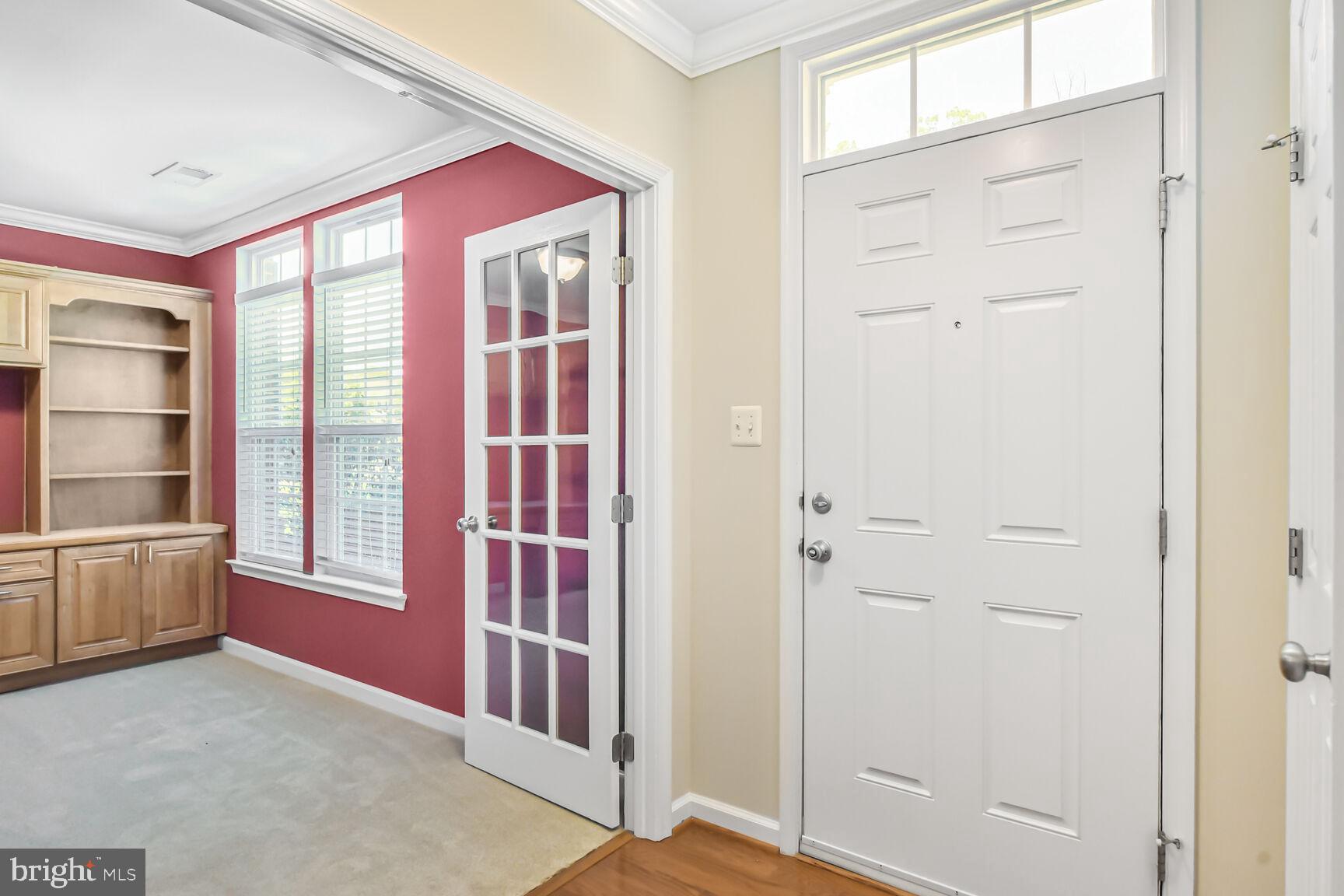 42952 Miltec Terrace Chantilly, VA 20152 - Photo 3 of 30 a view of a hallway with closet and livingroom view