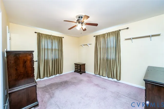 a view of livingroom with hardwood floor and hallway