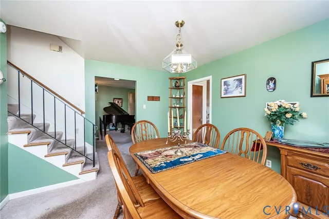 a bedroom with furniture and a chandelier