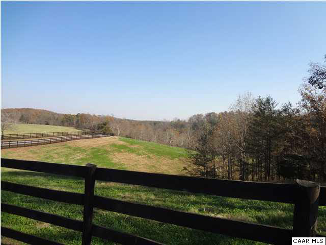 1777 Georgetown Farm Road Free Union, VA 22940 - Photo 15 of 17 a view of a yard with wooden floor and a lake view