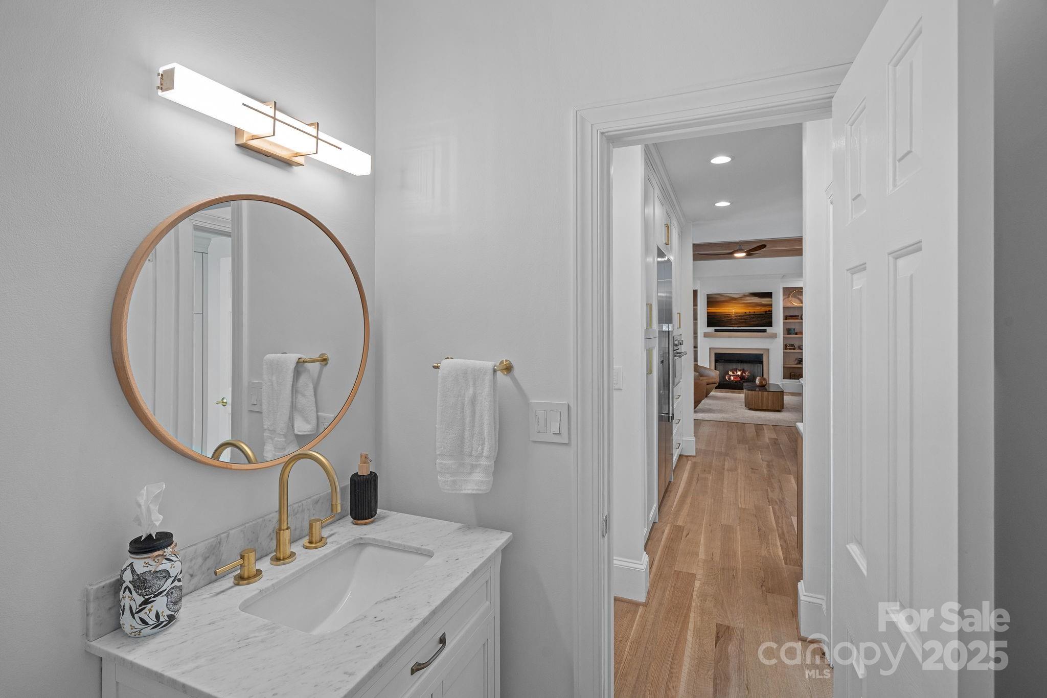 18613 John Connor Road Cornelius, NC 28031 - Photo 19 of 48 a bathroom with a sink and a mirror