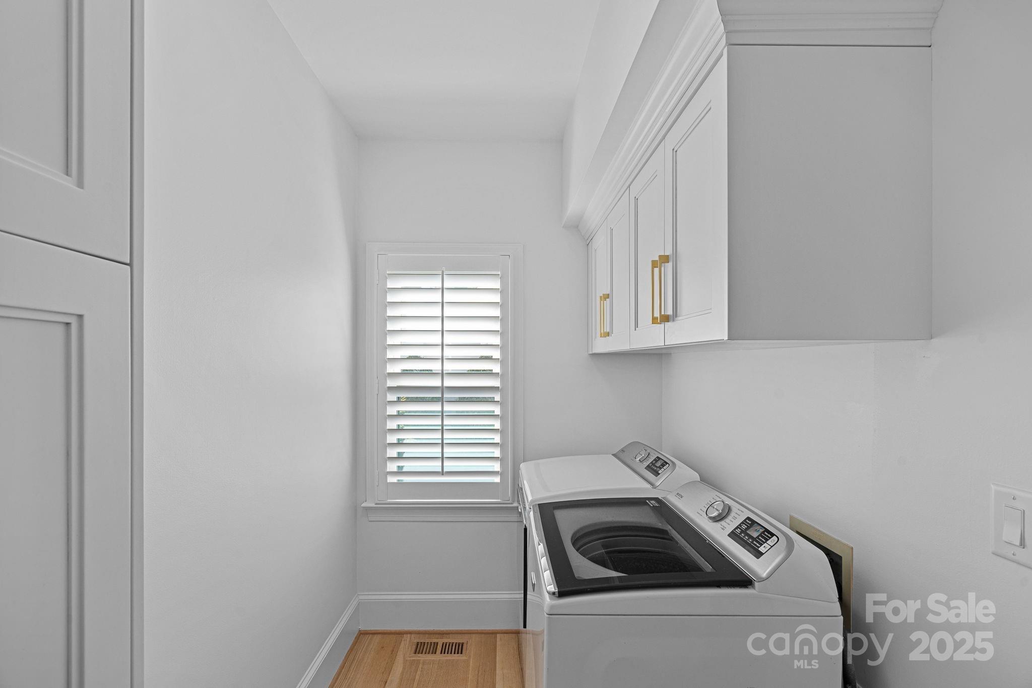 18613 John Connor Road Cornelius, NC 28031 - Photo 20 of 48 a kitchen with a sink a stove and cabinets