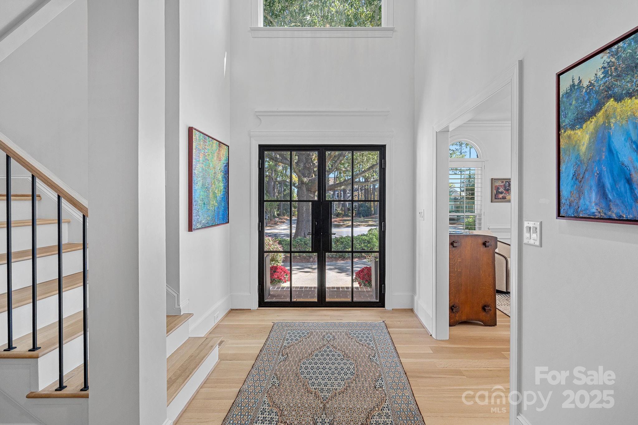 18613 John Connor Road Cornelius, NC 28031 - Photo 3 of 48 a view of a hallway with a entryway