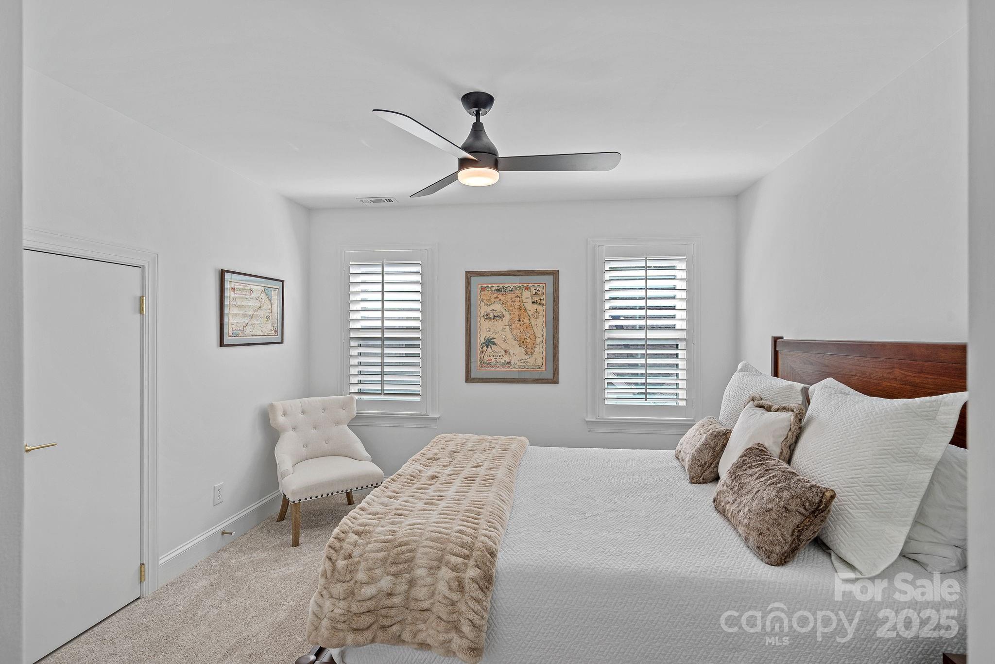 18613 John Connor Road Cornelius, NC 28031 - Photo 31 of 48 a bedroom with a bed and a window