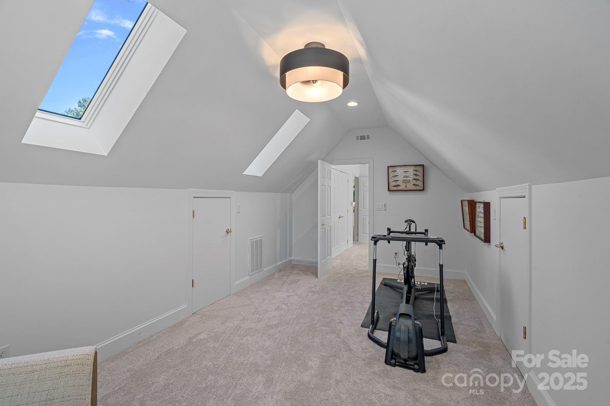 18613 John Connor Road Cornelius, NC 28031 - Photo 37 of 48 a view of a room with gym equipment