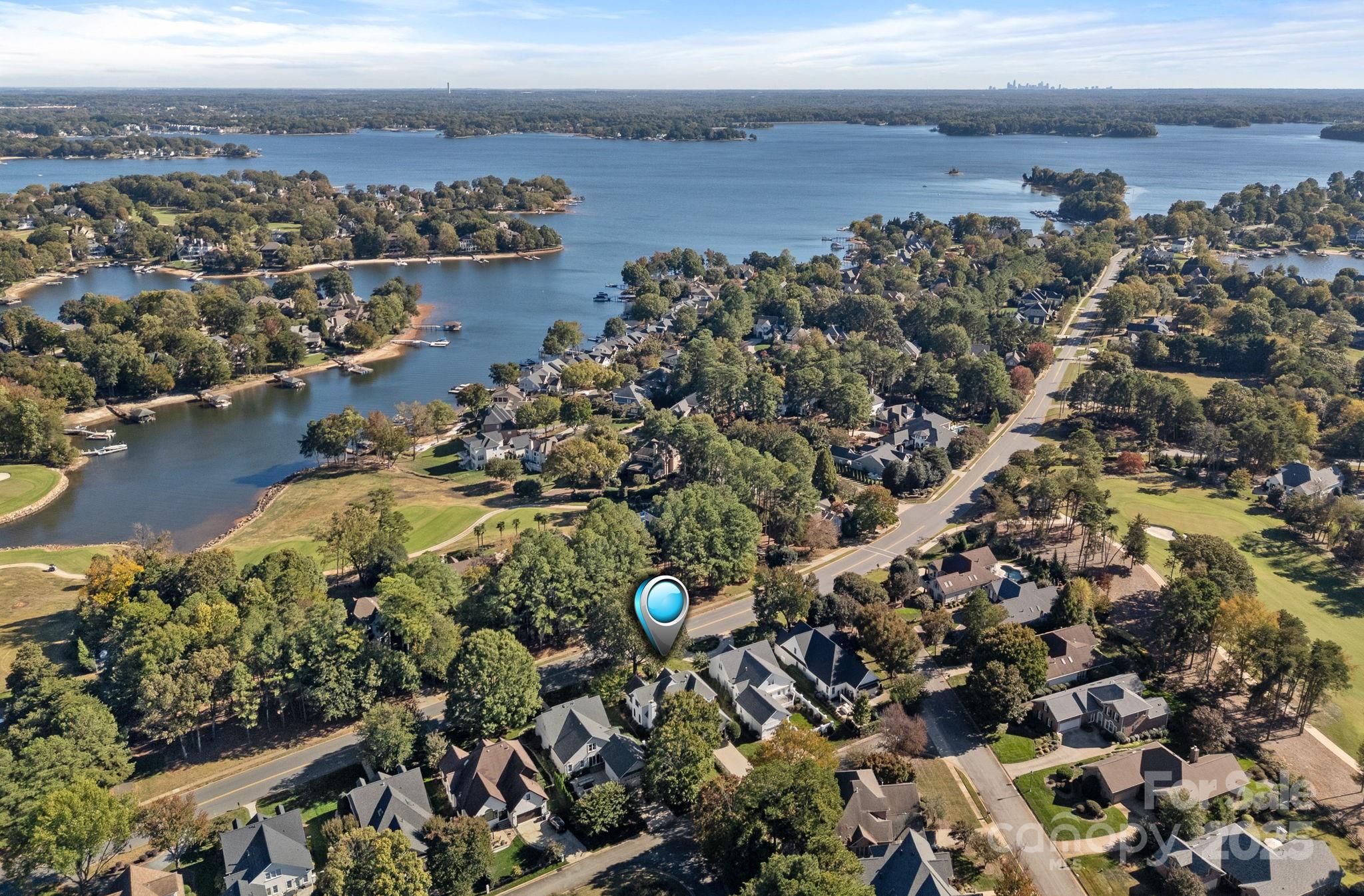 18613 John Connor Road Cornelius, NC 28031 - Photo 46 of 48 an aerial view of a residential houses covered in back and trees
