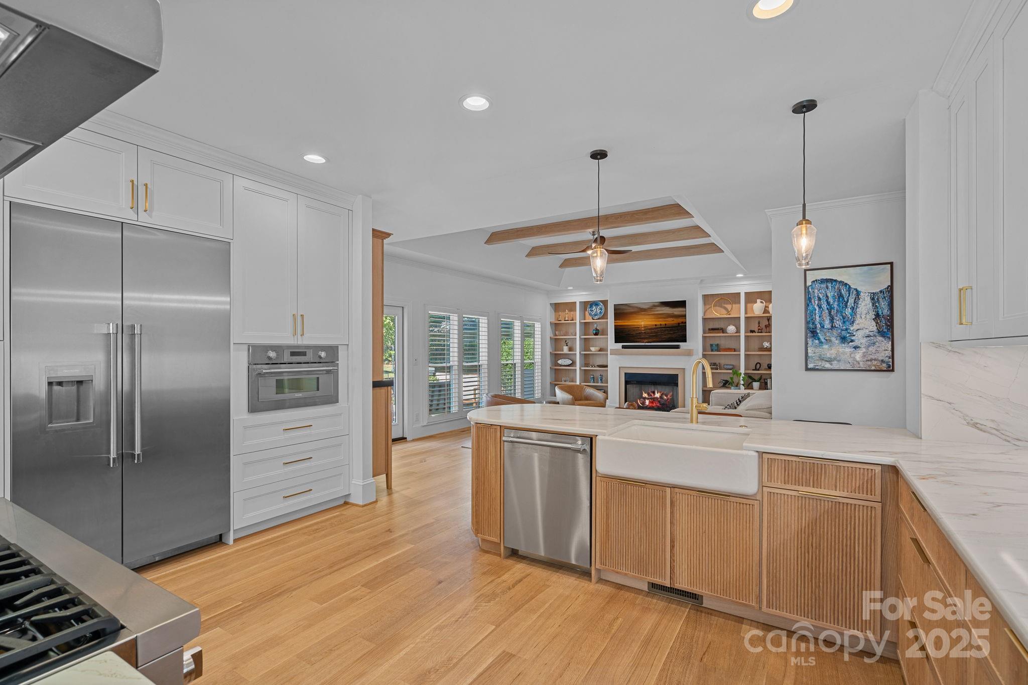 18613 John Connor Road Cornelius, NC 28031 - Photo 10 of 48 a kitchen with stainless steel appliances granite countertop a refrigerator and a stove top oven