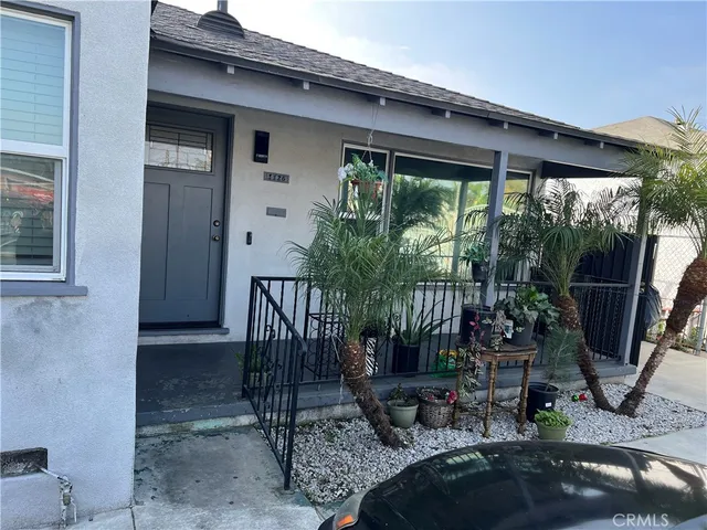 a backyard of a house with seating space