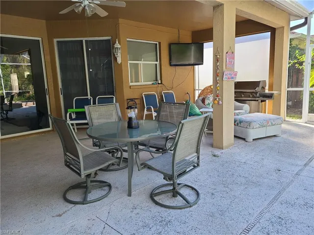 a view of livingroom and dining room with furniture
