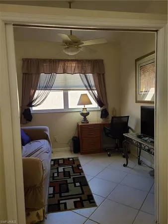 a kitchen with a stove a faucet and a table